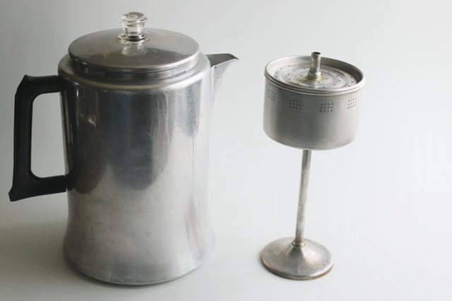 Stovetop coffee percolator — silver aluminum with black handles